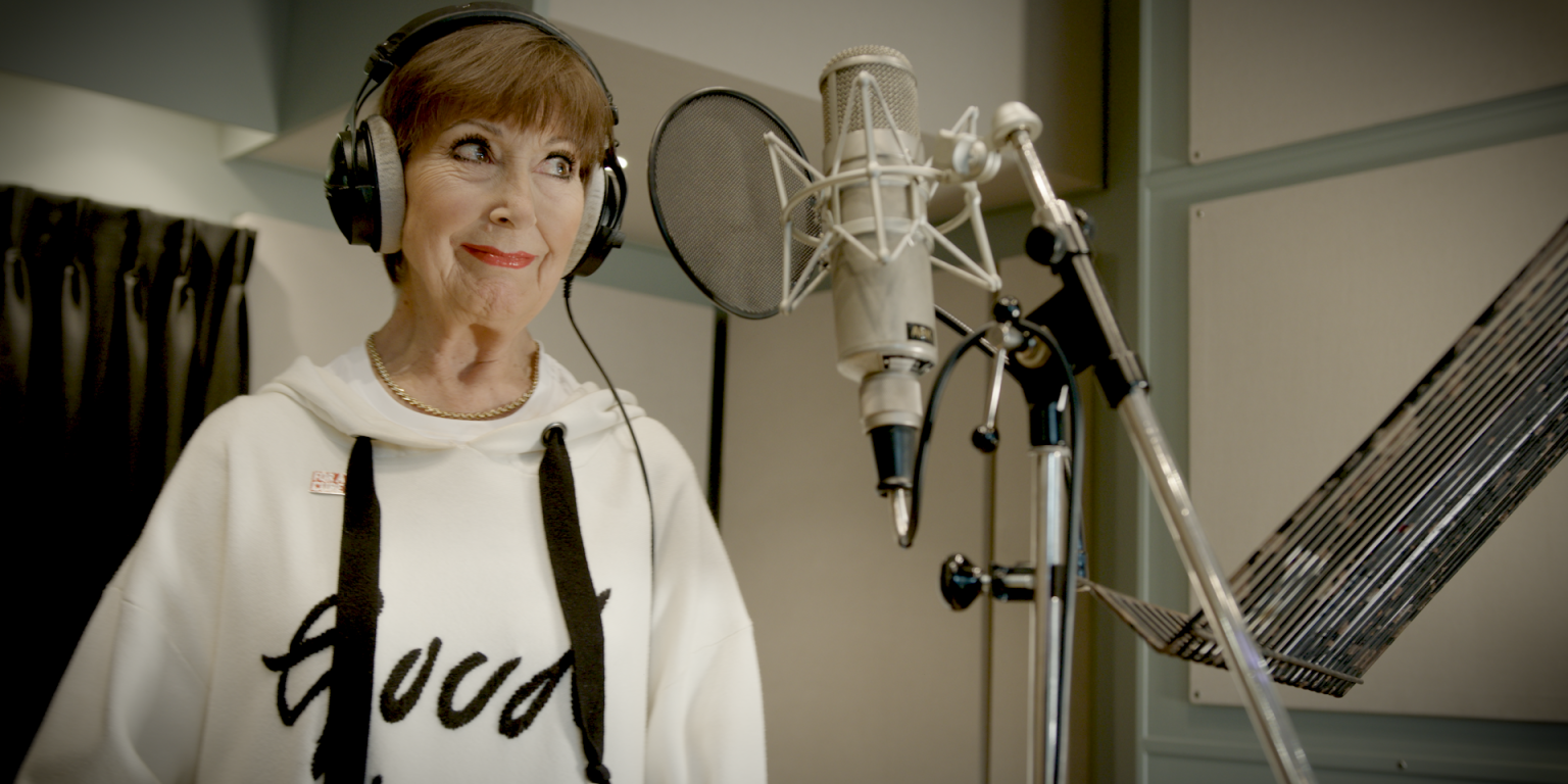 Discover Anita Harris's heartfelt tribute song 'Never Lose Hope,' honoring her late husband and supporting Alzheimer's Research UK